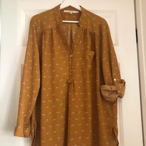 Mustard blouse with roll-tab sleeves